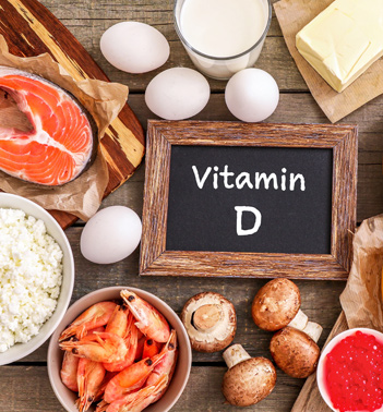 A variety of foods rich in vitamin D, such as salmon, eggs, shrimp, mushrooms, and dairy.